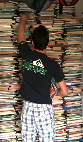 Nick Camarda storing donated books